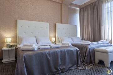 Семейный суперлюкс с панорамным видом в Отеле Hotel Piazza
